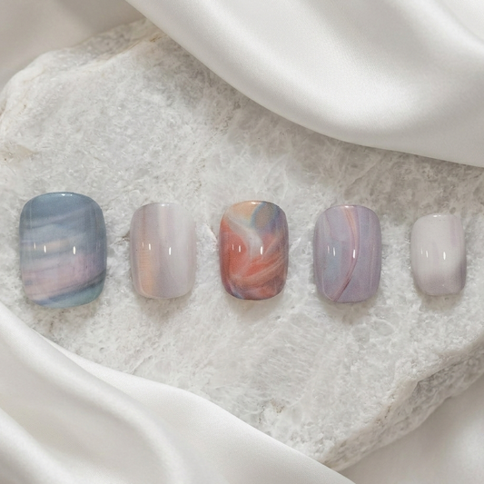 Soft pastel marble swirl press-on nails, aesthetic abstract nail art design