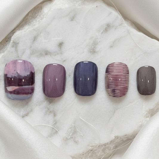 Textured plum and grey abstract brushstroke nail art, hand-painted style press-on set